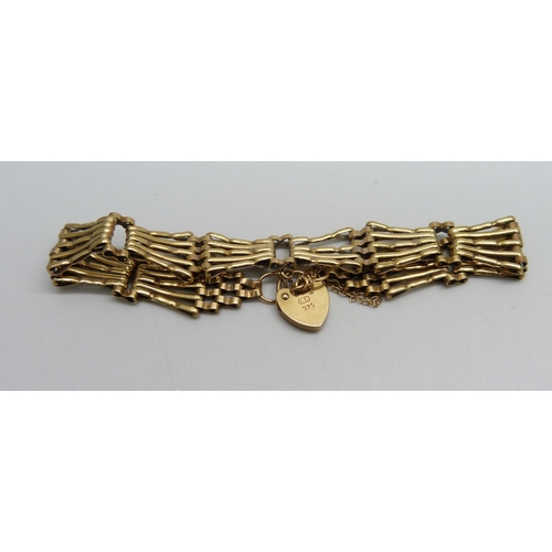 968 - A 9ct gold five bar gate bracelet, 12.3g