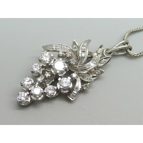 970 - A vintage 18ct white gold and diamond articulated pendant in the form of a bunch of grapes, on an 18... 