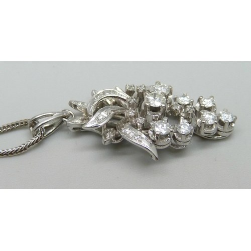 970 - A vintage 18ct white gold and diamond articulated pendant in the form of a bunch of grapes, on an 18... 