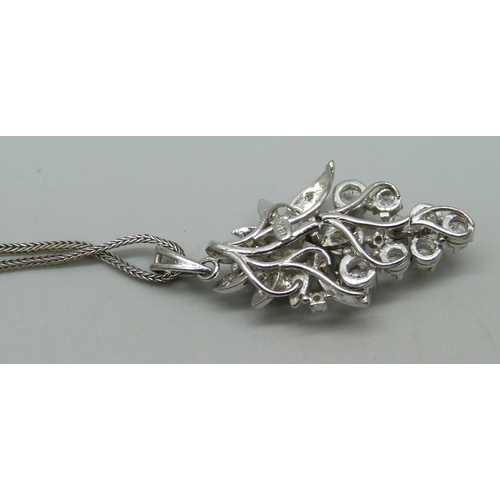 970 - A vintage 18ct white gold and diamond articulated pendant in the form of a bunch of grapes, on an 18... 