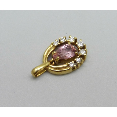 972 - An 18ct gold articulated pendant set with a pink stone and diamonds, 1.7g