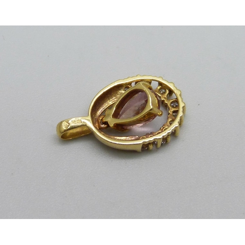 972 - An 18ct gold articulated pendant set with a pink stone and diamonds, 1.7g