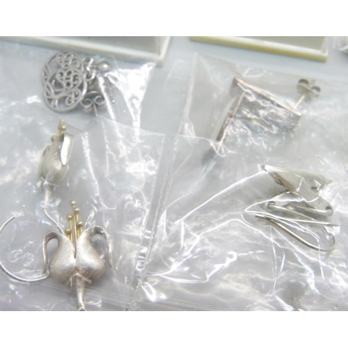 975C - Twenty five pairs of silver earrings