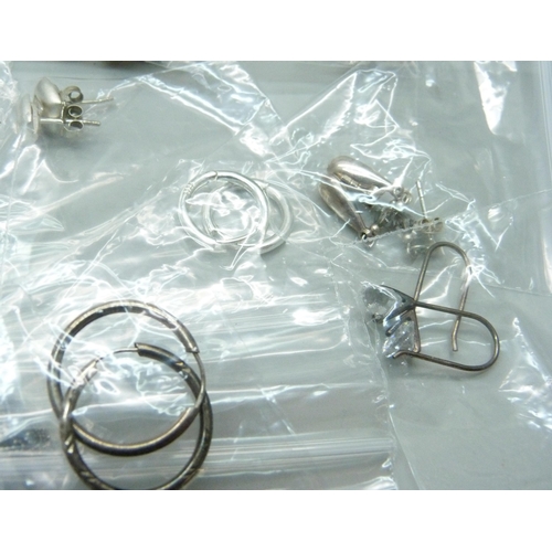 975C - Twenty five pairs of silver earrings