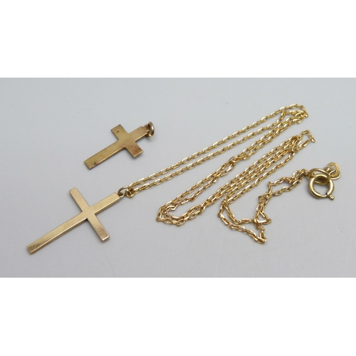 978 - Two 9ct gold cross pendants and a 9ct gold chain, 6.7g, chain 60cm