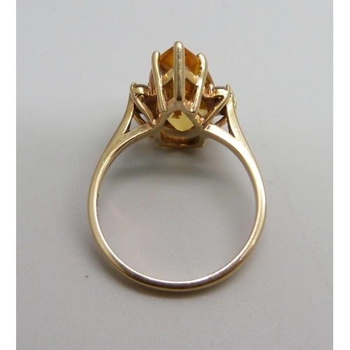 986 - A 14ct gold, citrine and diamond ring, 3.8g, N