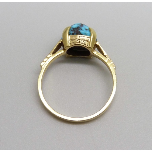 988 - An 18ct gold and turquoise ring, 3.6g, P