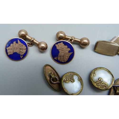 994 - A pair of 9ct gold and enamelled cufflinks, early 20th Century with Australia map and states detail,... 