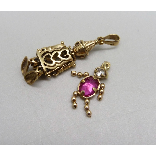 997 - A 9ct gold articulated rag-doll pendant or charm, a/f, lacking stones, and a smaller 9ct gold charm,... 