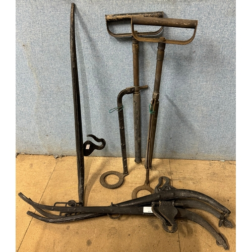 319 - Two pairs horse hames, two vintage stirrup water pumps and a coal scuttle