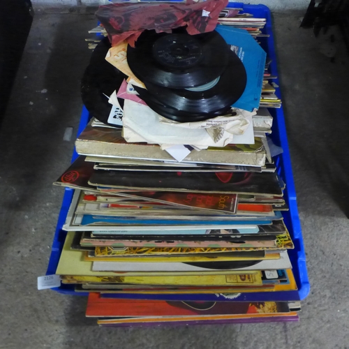2126 - A box of approx 40 LP vinyl records and singles