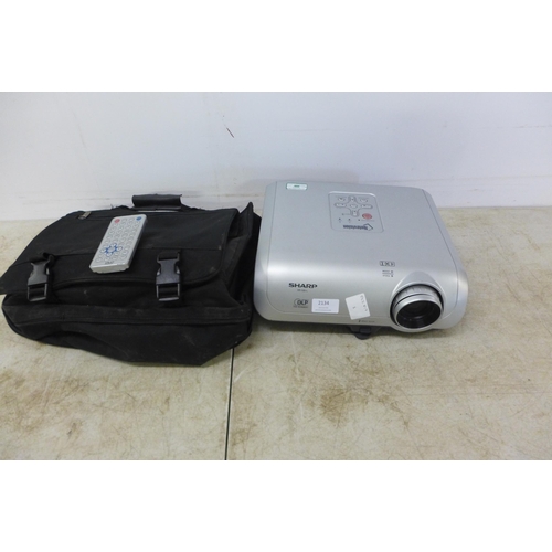 2134 - A Sharp XR-10S-L LED projector in soft case