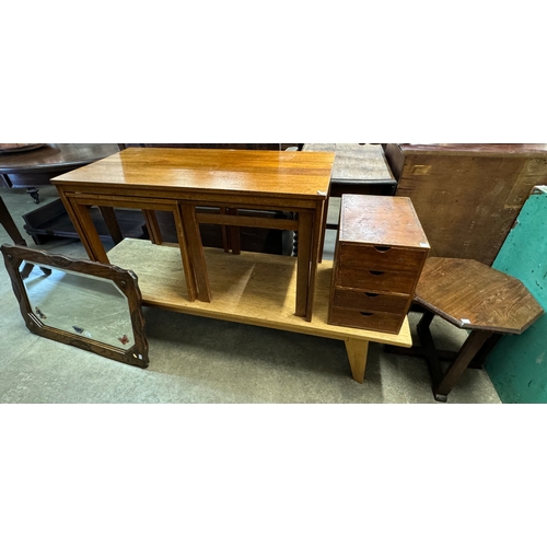 275 - A mahogany nest of tables, a pine coffee table, an octagonal occasional table, a small table top che... 