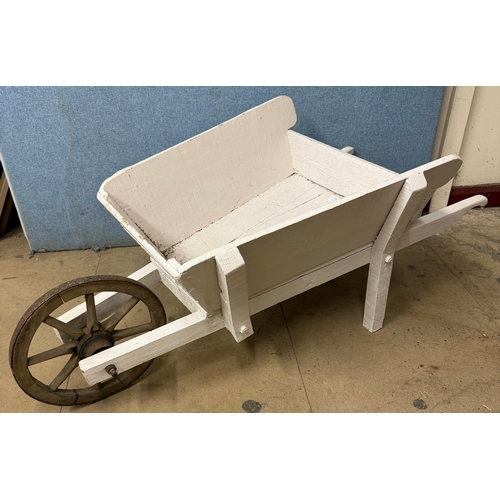 322 - An early 20th Century painted wheelbarrow