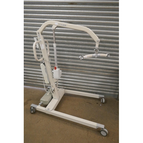2174 - A Prism A-205 electronic mechanical medical hoist with 205kg (32 stone) lifting capacity