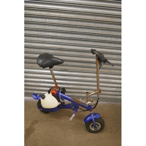 2175 - A Storm Scooter GS706A petrol driven scooter - no key and a petrol driven folding mini bike - no key