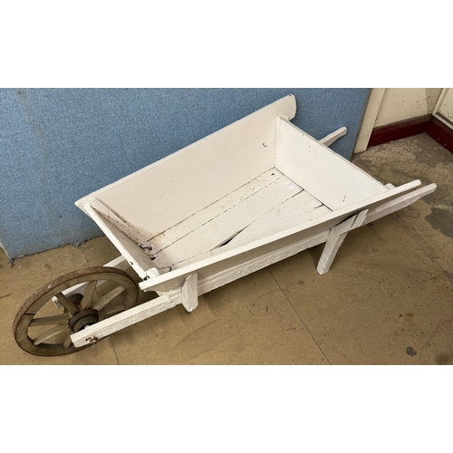 323 - An early 20th Century painted wheelbarrow