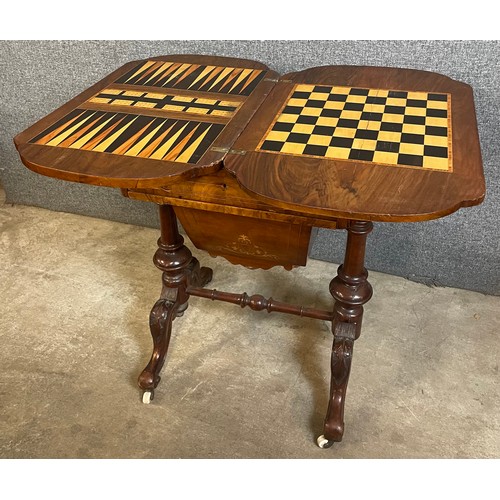 136 - A Victorian inlaid walnut lady's sewing/games table