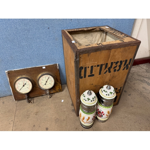 326 - Two Becks beer pumps, an altitude gauge and a tea crate