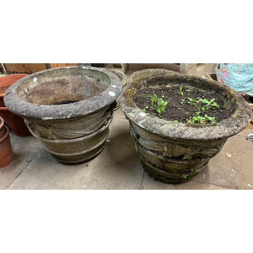 335 - A pair of large concrete planters