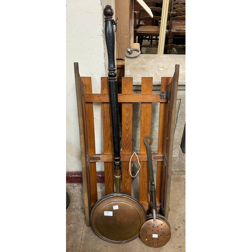 338 - Two brass warming pans and a child's sledge