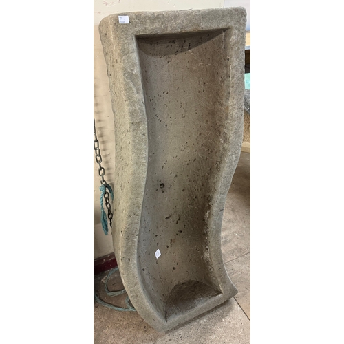 339 - A large concrete S-shaped trough