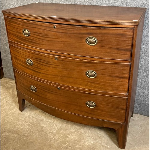 112 - A George III mahogany bow front chest of drawers
