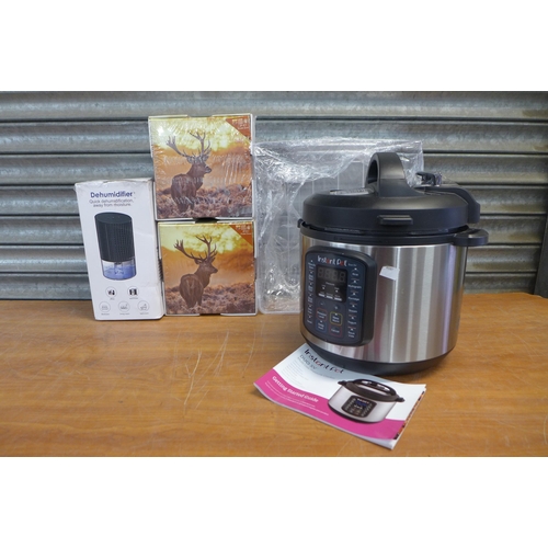 2304 - An Instant Pot Duo SV multi use pressure cooker, a YP2119 dehumidifier and two sets of 3 piece canva... 