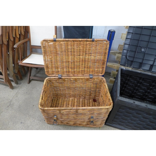 2329 - A Keter style garden storage box and a large wicker basket