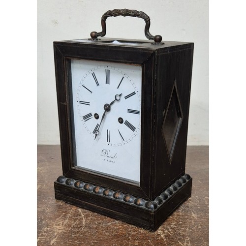 372 - An early 20th Century Duval of Paris ebonised mantle clock