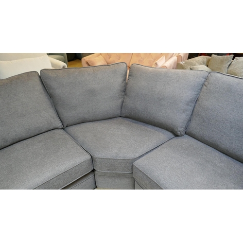 1523 - A deep blue upholstered corner sofa