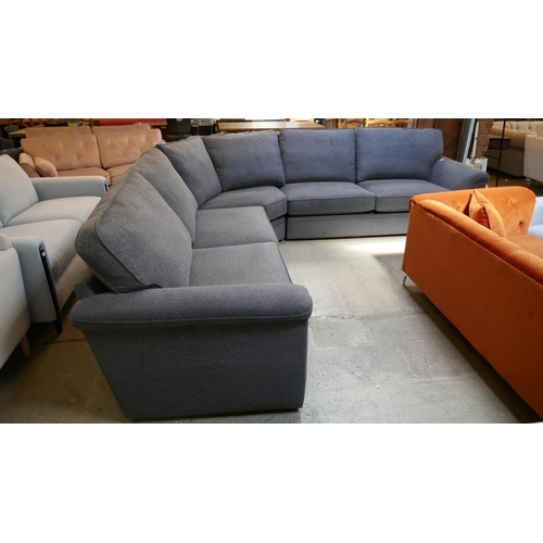 1523 - A deep blue upholstered corner sofa