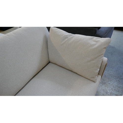 1529 - A linen upholstered three seater sofa RRP £1349