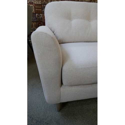 1530 - A linen upholstered three seater sofa RRP £1199