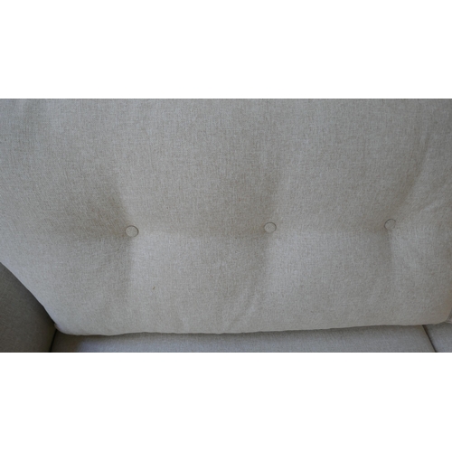 1530 - A linen upholstered three seater sofa RRP £1199