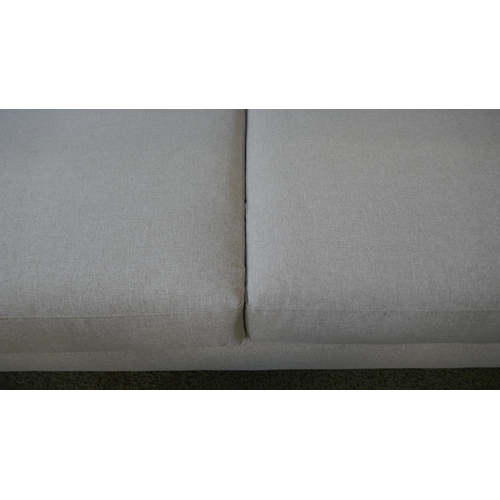 1530 - A linen upholstered three seater sofa RRP £1199