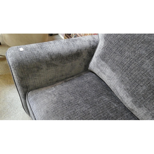 1531 - A deep blue upholstered three seater sofa