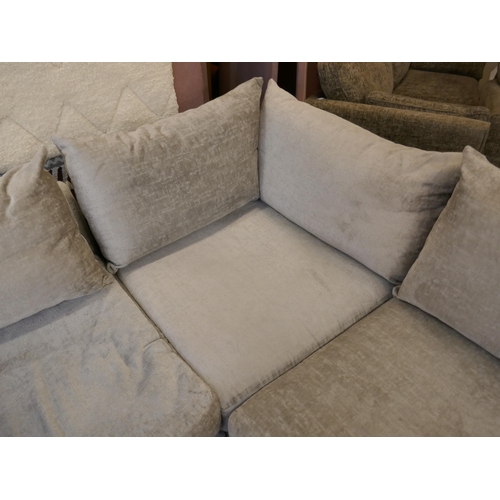 1534 - A silver velvet corner sofa