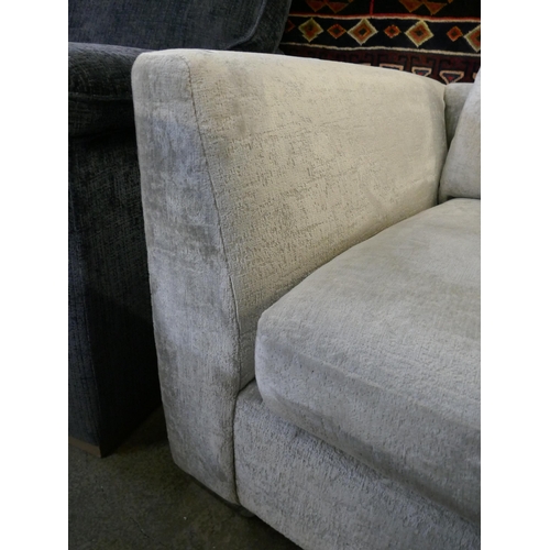 1534 - A silver velvet corner sofa