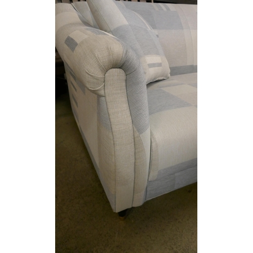 1537 - A blue patterned two seater sofa