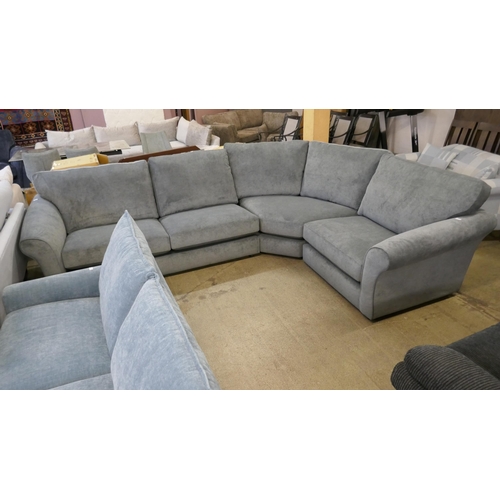 1538 - A pewter upholstered corner sofa