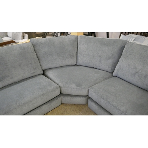 1538 - A pewter upholstered corner sofa