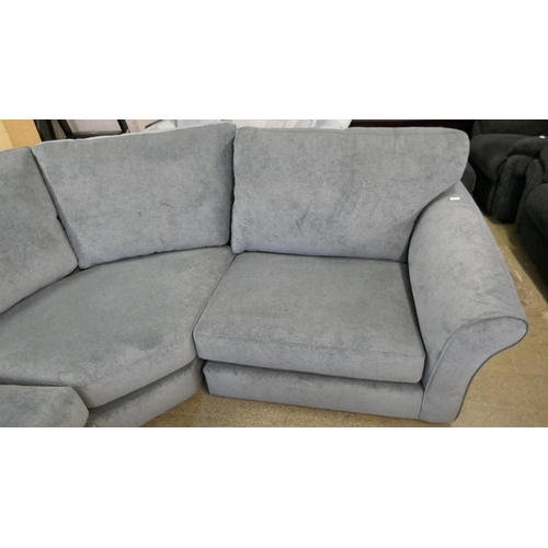 1538 - A pewter upholstered corner sofa