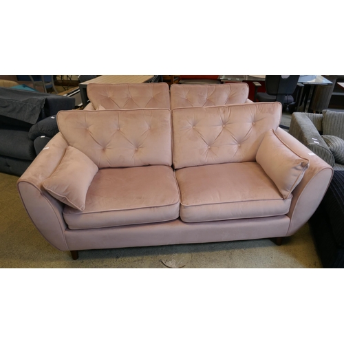 1555 - A pair of pink velvet Hoxton three seater sofas