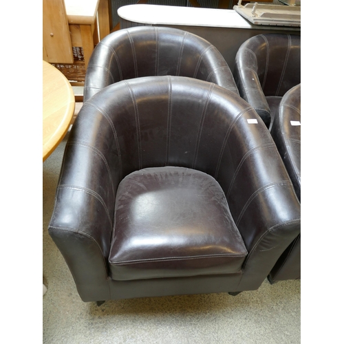 1567 - A pair of brown leather effect tub chairs