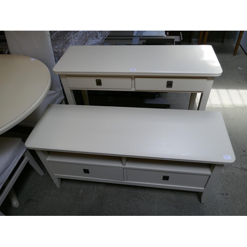 1602 - An off white console table and TV stand