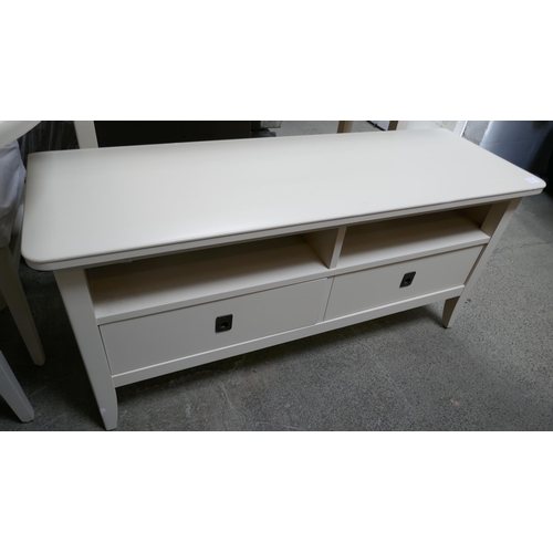 1602 - An off white console table and TV stand