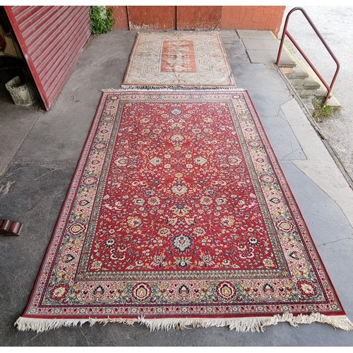 221 - Two eastern red ground rugs (320x200cm & 235x165cm)