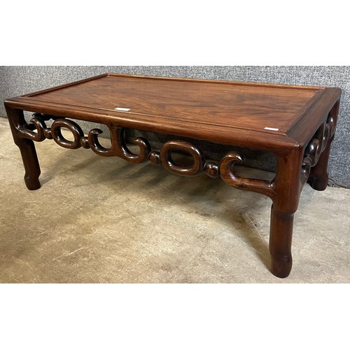 139 - A late 19th/early 20th Century Chinese hardwood opium table