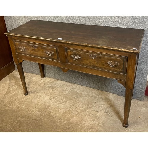 143 - A George II style oak two drawer dresser